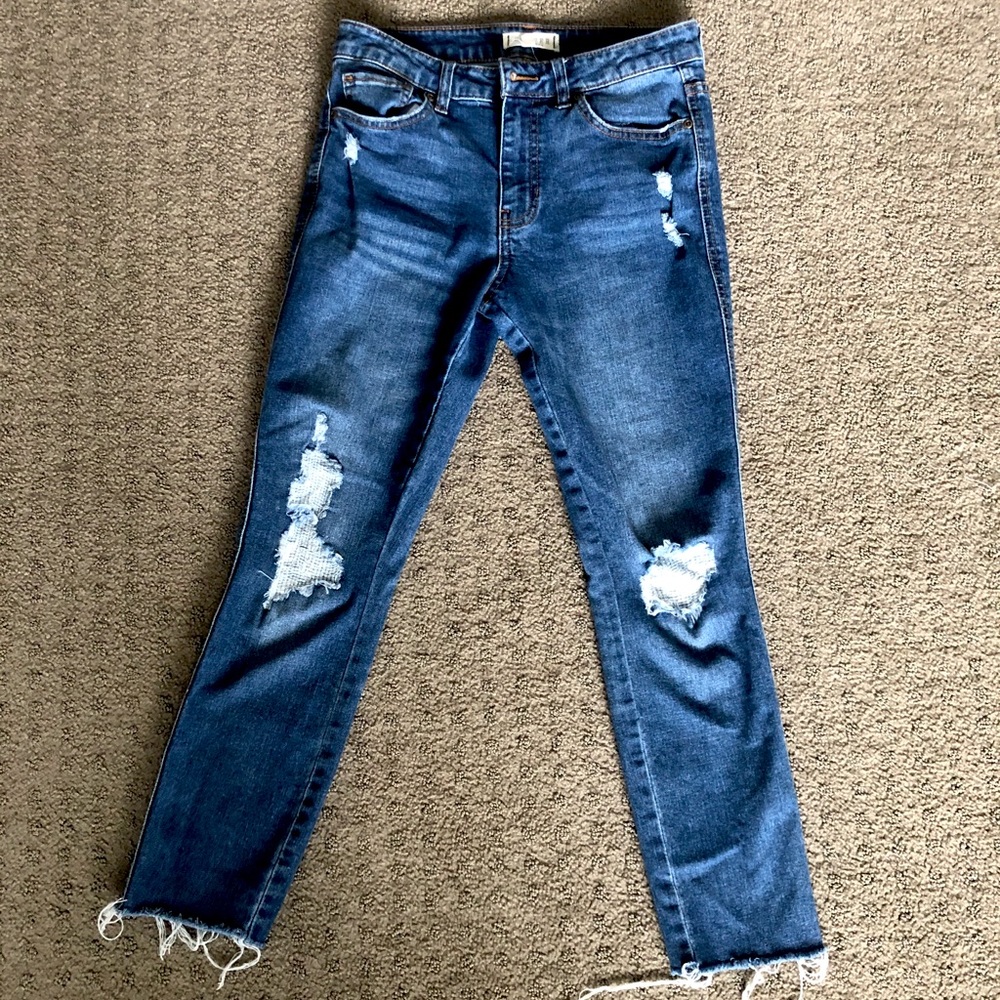 Dark blue skinny jeans with rips